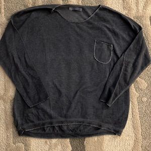 Graysih-blue long sleeved shirt.
